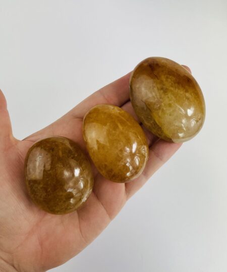 Golden healer palmstone – gylden krystal til healing, energi og spirituel balance